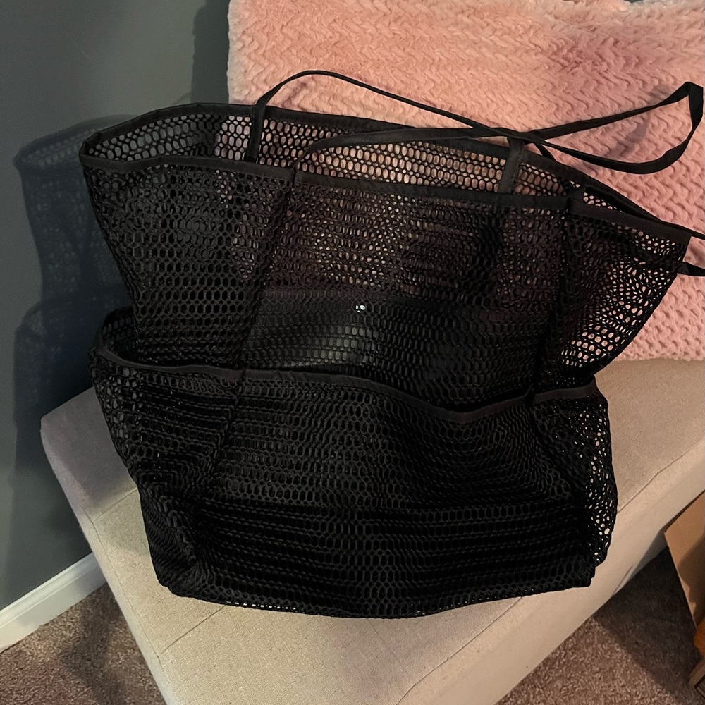 Mesh beach bag never used.